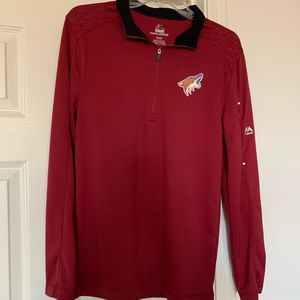 Phoenix Coyotes pullover cool base top. Size small with zipper sleeve pocket